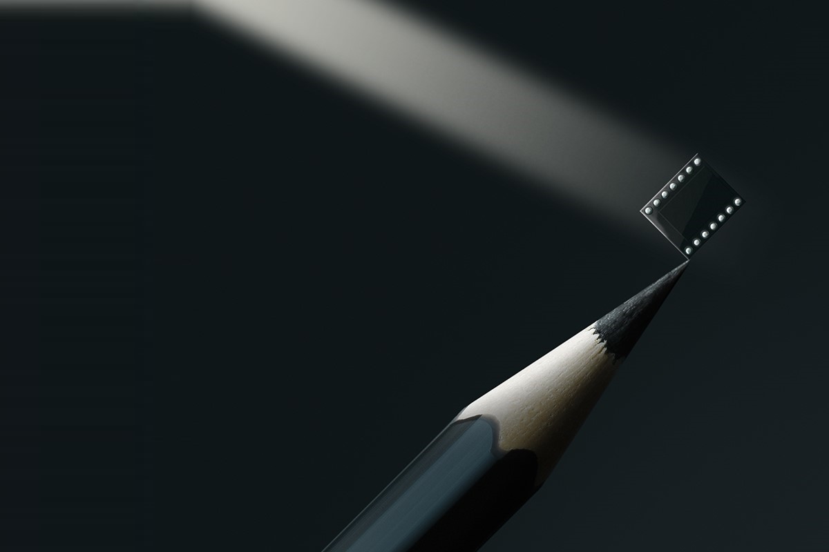 ERNIE 5 Machine with a pencil to show how small it is