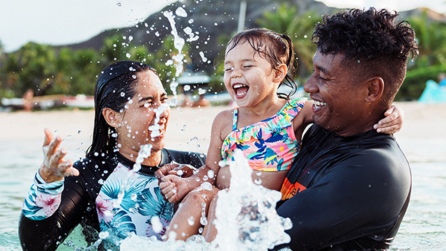 A family playing in the sea