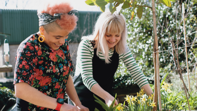 Two women at home gardening
